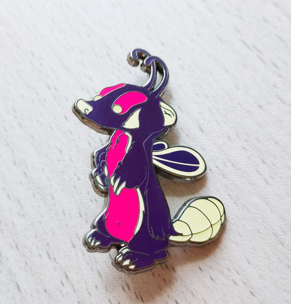 Enamel pin of Badgerbug the purple and yellow bug and badger hybrid