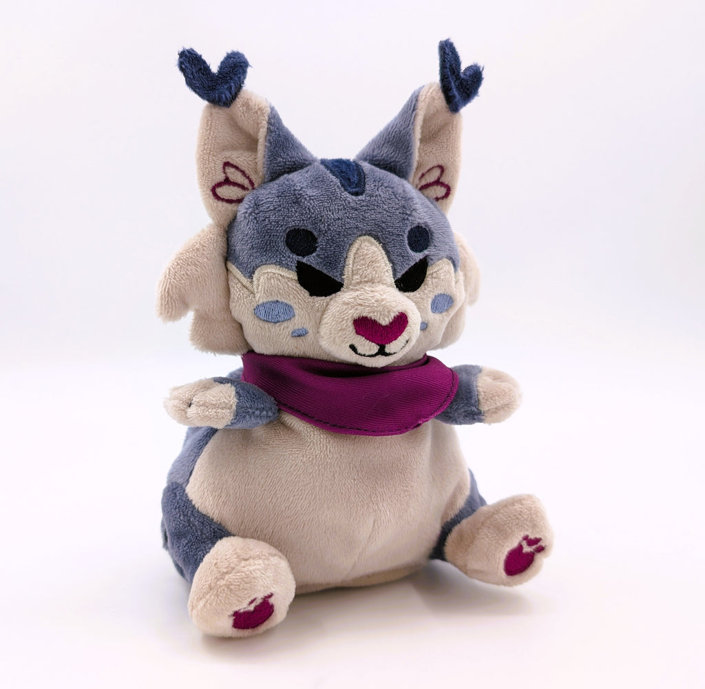 Plush toy of a Lynx on a white background