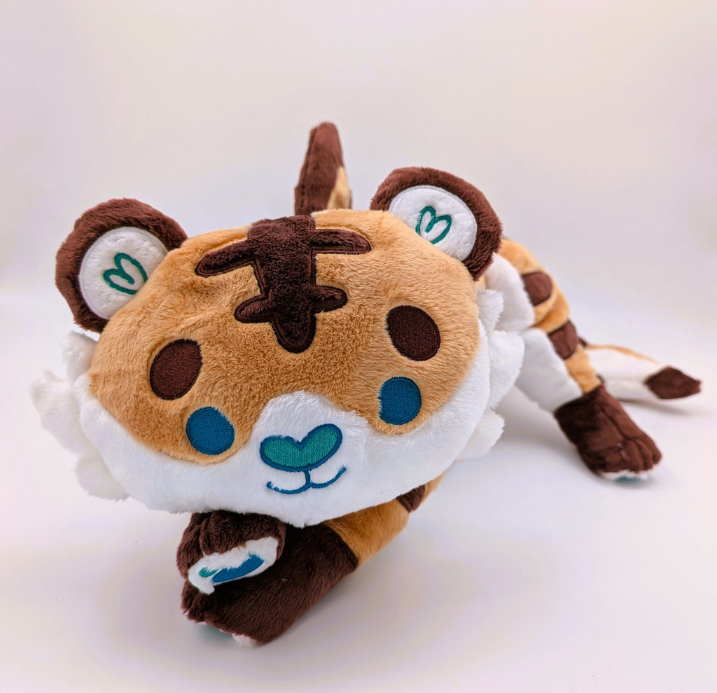 Plush toy of Cornflakes the Tiger and Shark hybrid