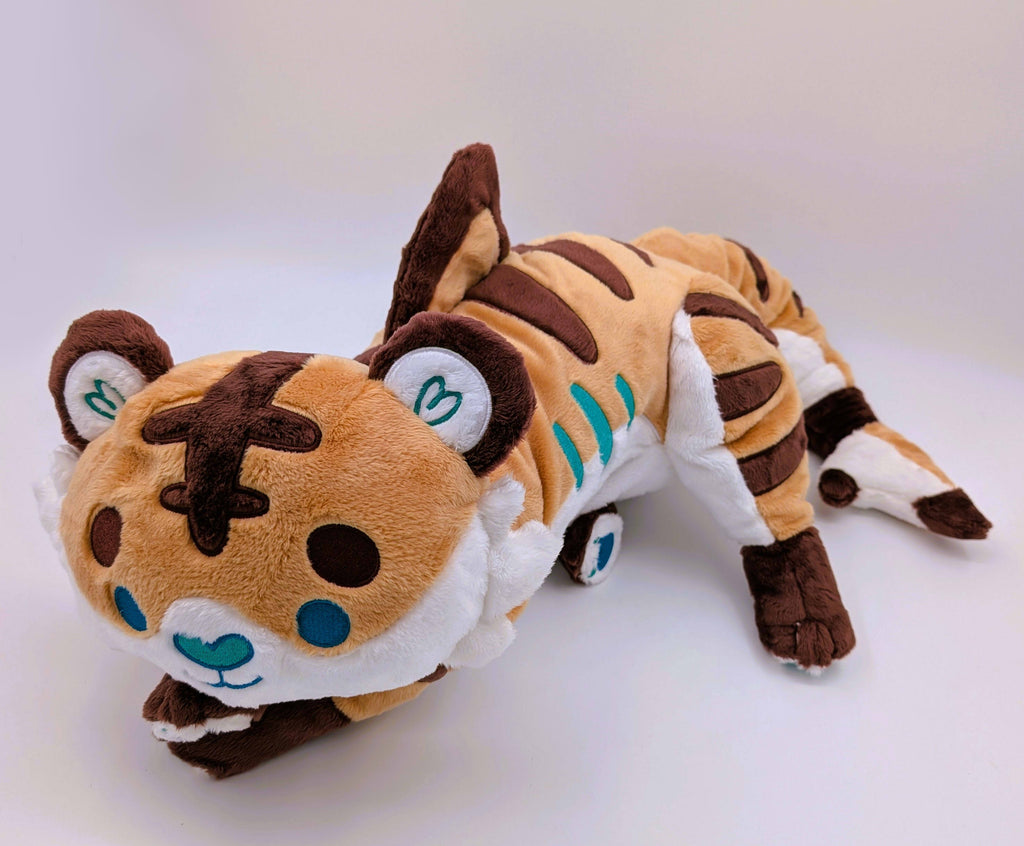 Plush toy of Cornflakes the Tiger and Shark hybrid