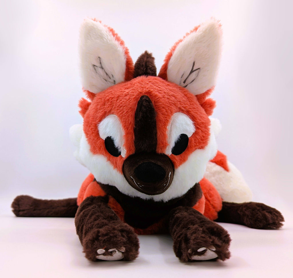 Plush toy of Paprika the maned wolf