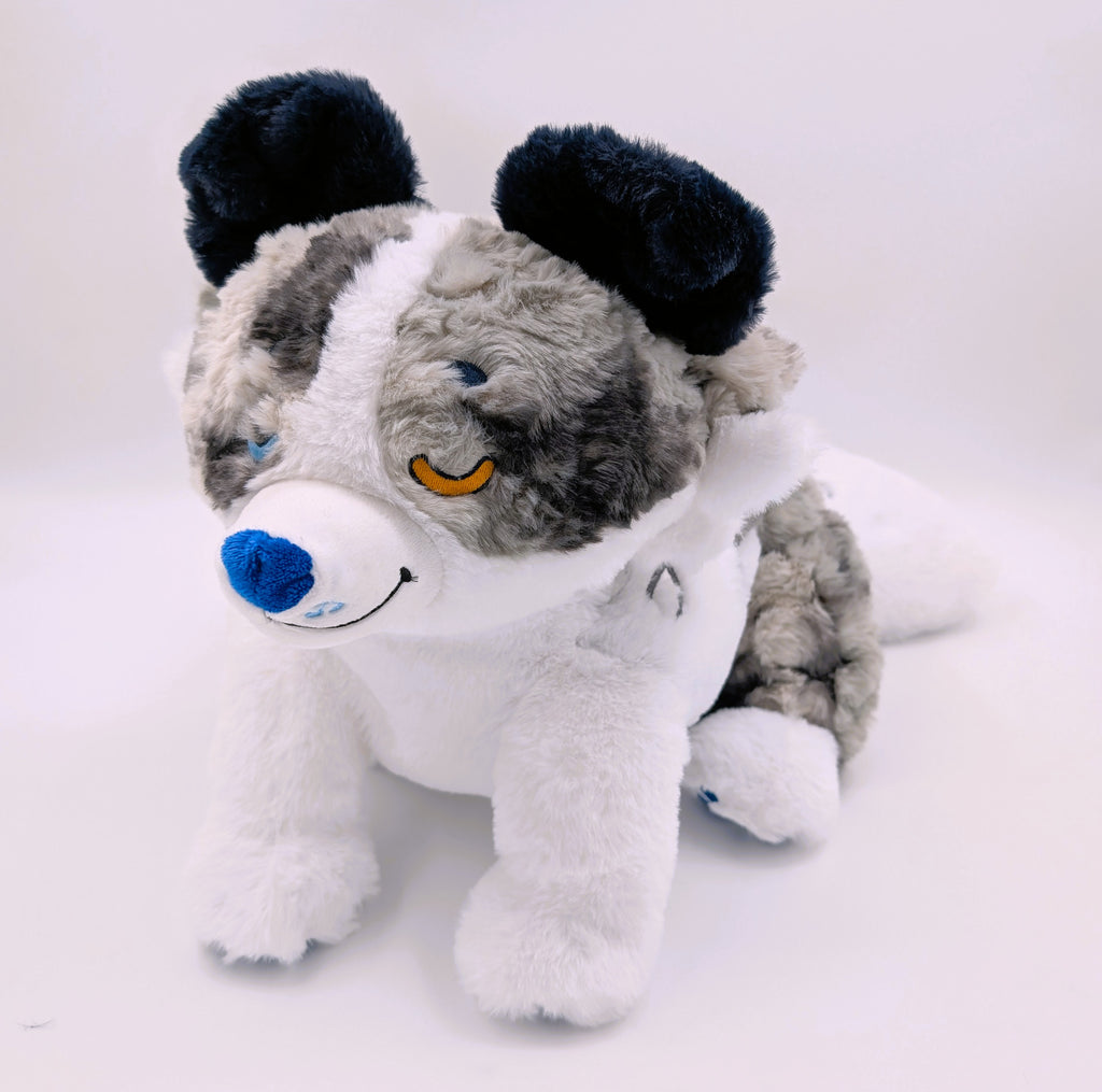Plush toy of a blue merle border collie with a blue nose