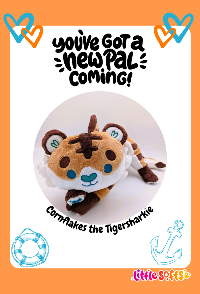 Postcard of plush toy of Cornflakes the tiger and shark hybrid that says "you've got a new pal coming!"