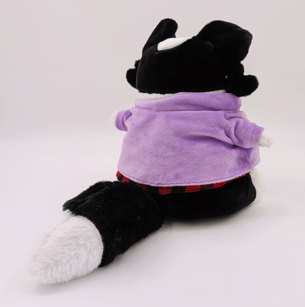 Back view of CosyPaws plush of Starry Pup the black and white border collie wearing a purple jacket