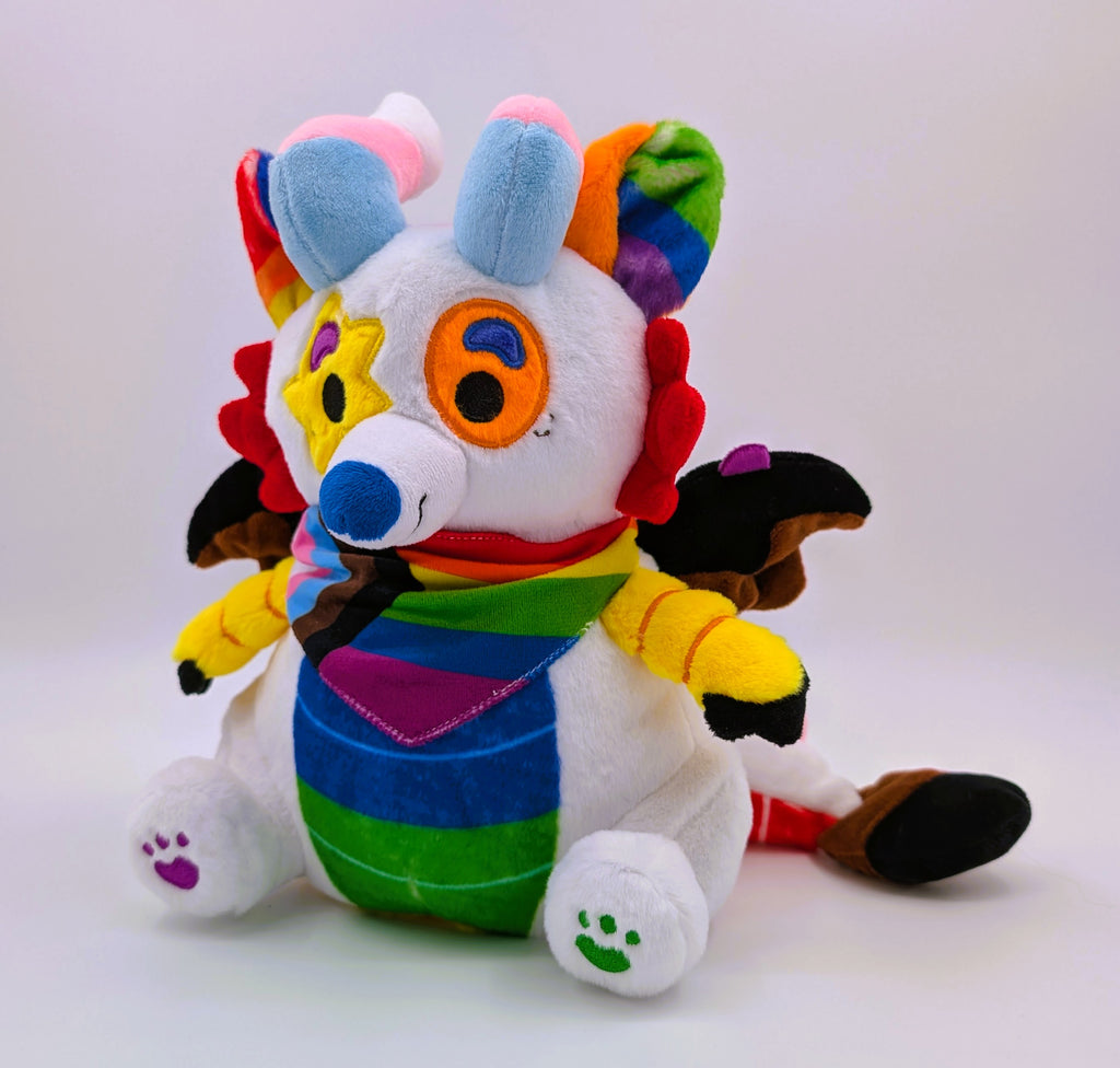 Plush toy of Mixtape the rainbow sparkledog dragon 
