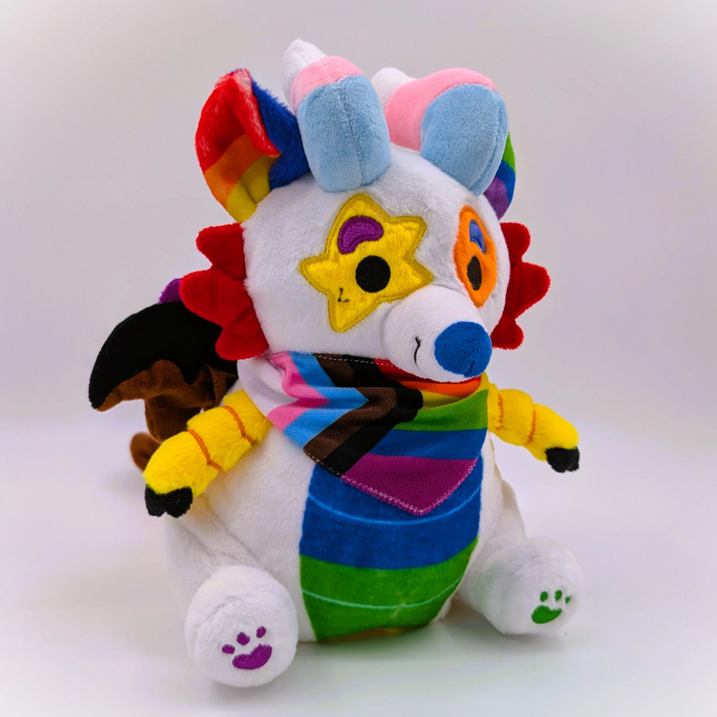 Plush toy of Mixtape the rainbow dragon