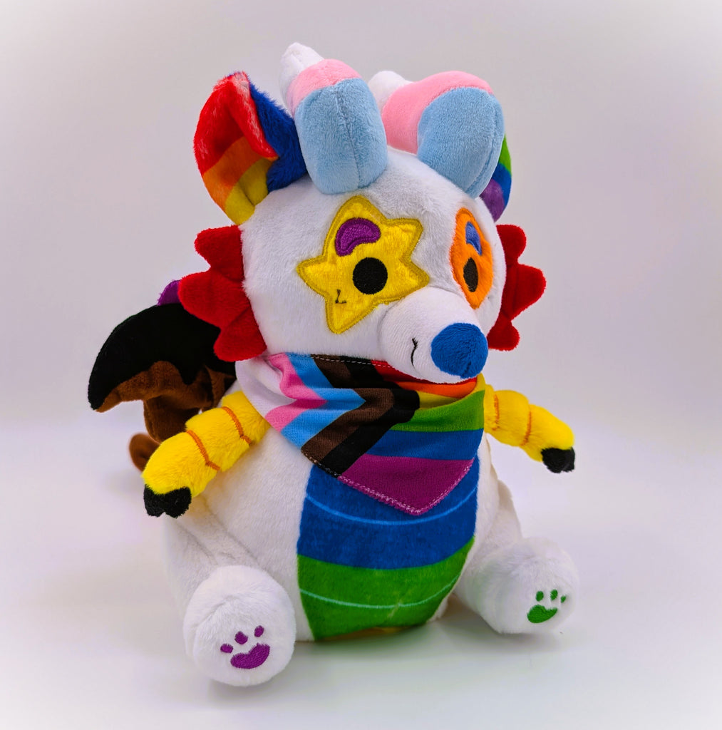 Plush toy of Mixtape the rainbow sparkledog dragon 