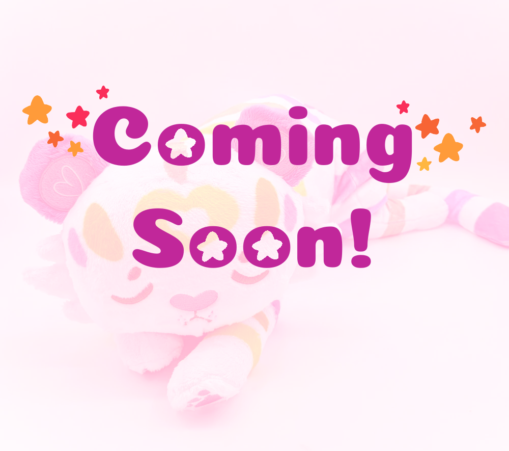 Plush toy of Mochi the pastel rainbow tiger with coming soon text