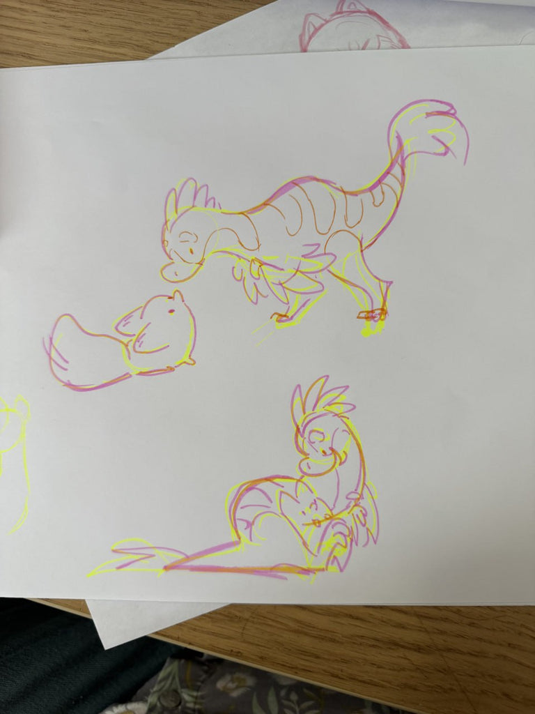 Sketches of a cartoon raptor and white fox