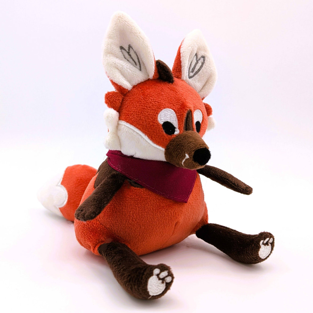 Plush toy maned wolf with a white background