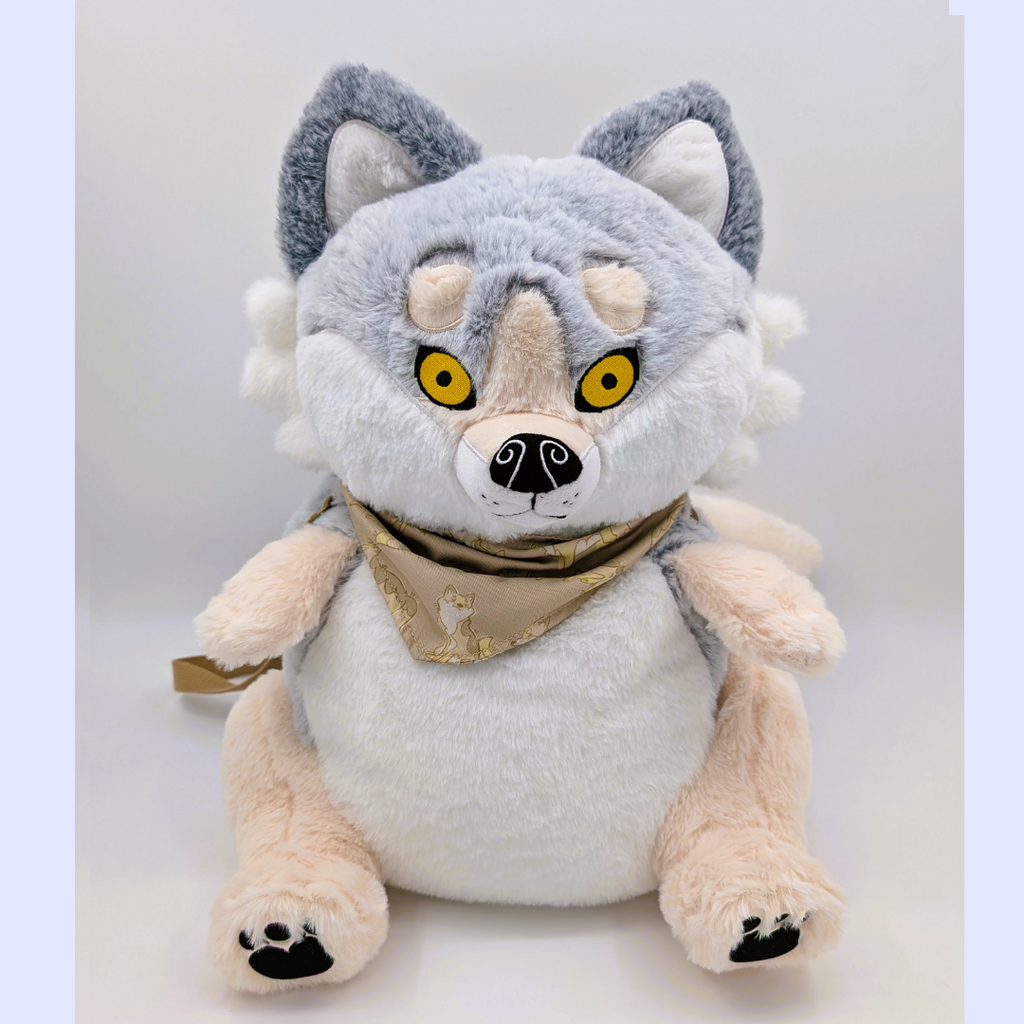 Plush backpack of a wolf with yellow eyes and a beige bandana on a white background