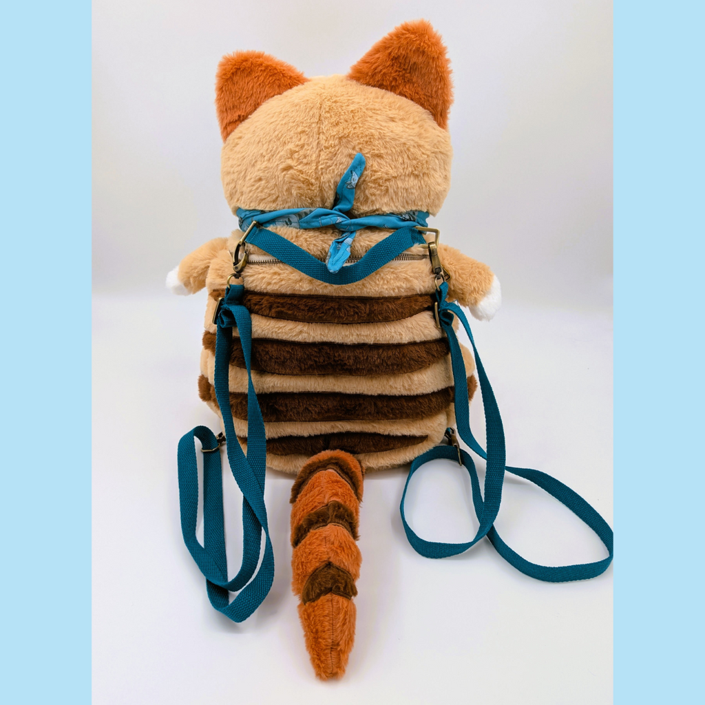 Back view of a plush backpack of a thylacine