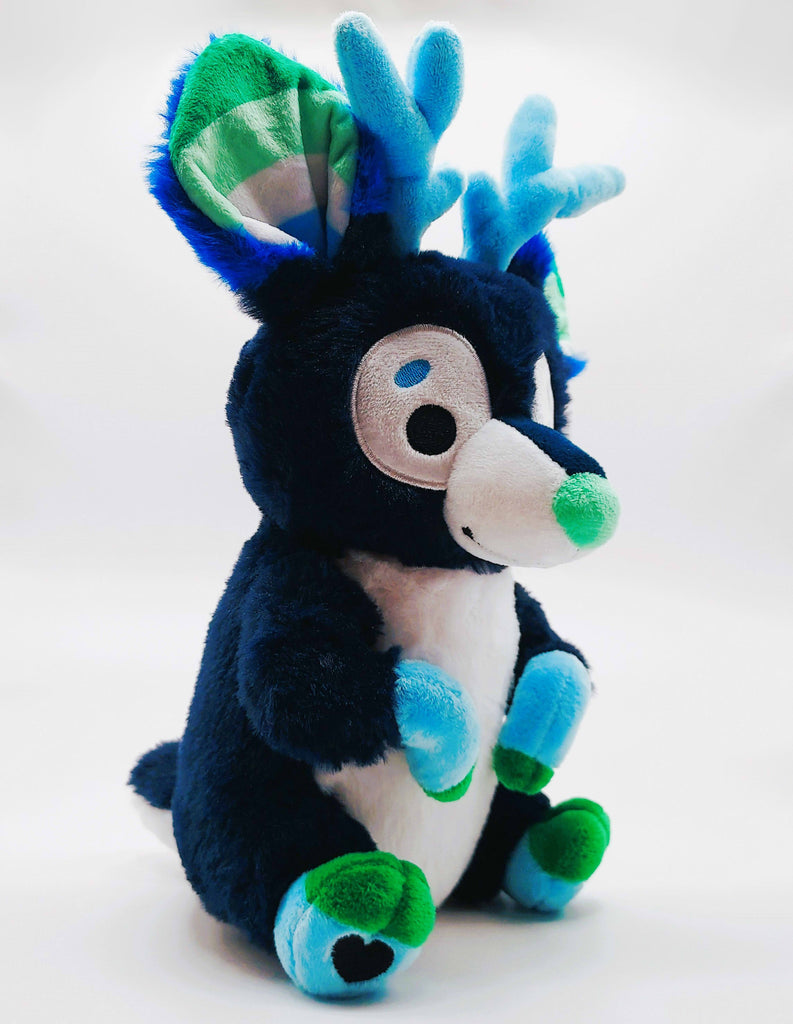 Plush toy of Smoothie the blue and green stag