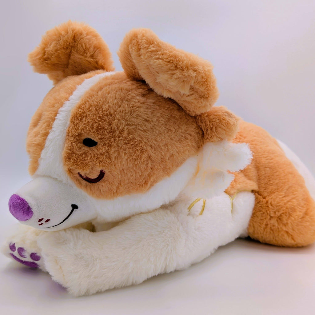 Plush toy of a red border collie with purple nose