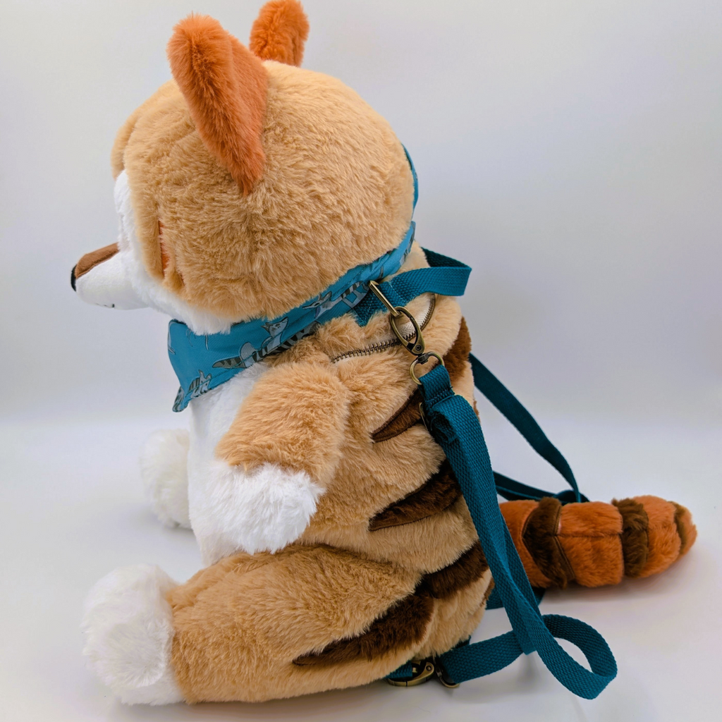 Side view of a plush backpack of a thylacine