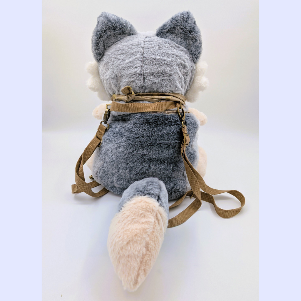 Back view of a plush backpack of a wolf