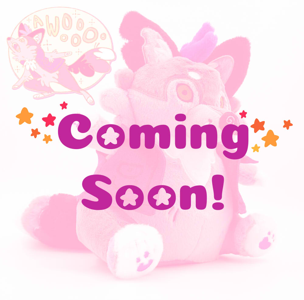 Plush toy and pin of Wolfgang the werewolf that says "coming soon."